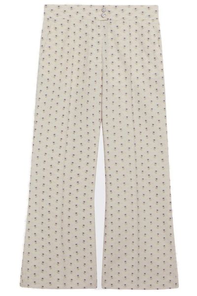 Valentino All-Over Floral Patterned Flared Pants